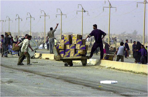 The Looting of Baghdad.-On April 8th, 2003 the looting began.-William E. Thompson
